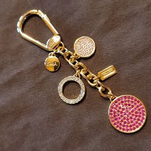 Coach key ring/ purse charm